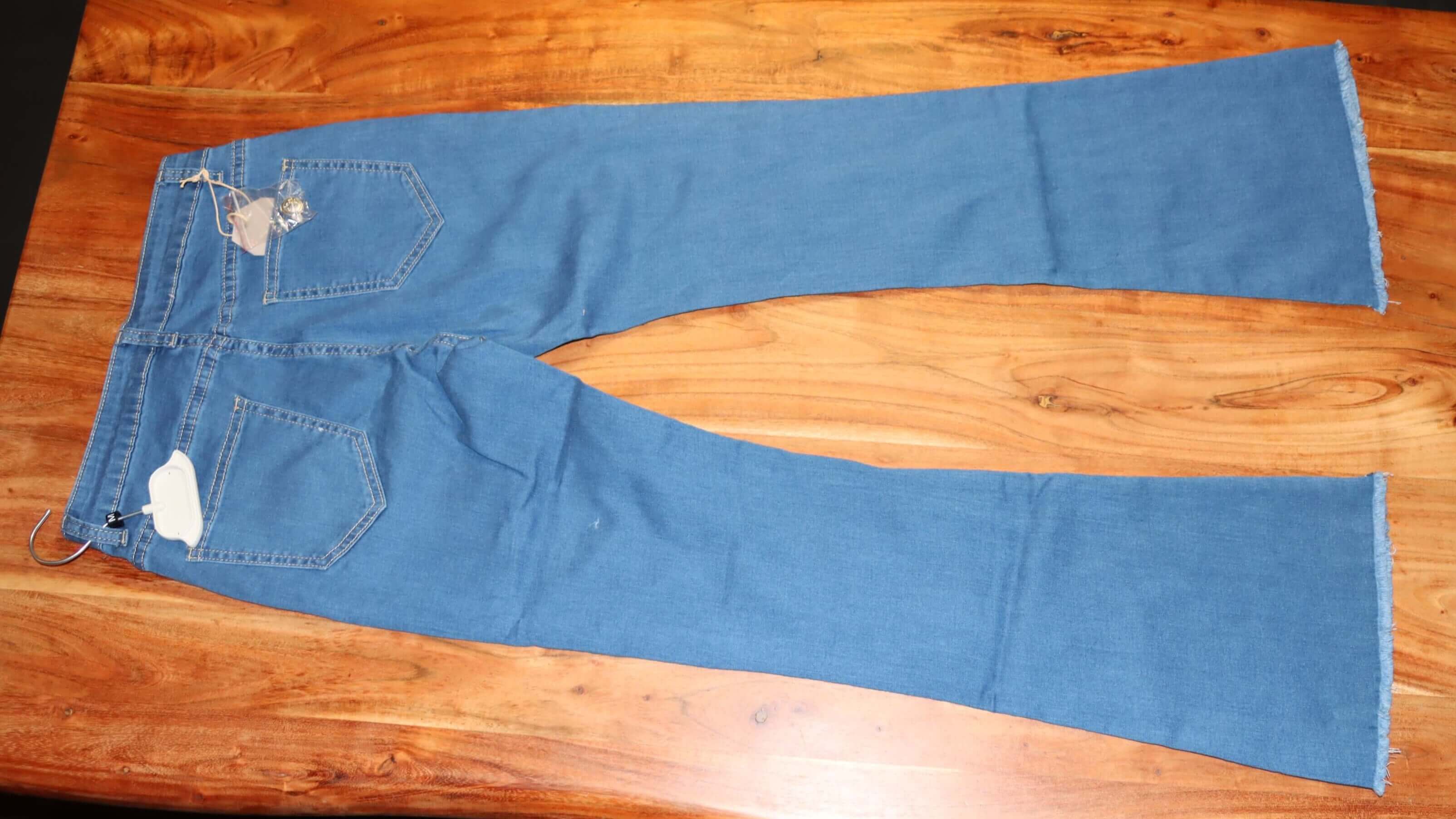 flare jeans, ripped edge jeans, blue jeans, jeans woman